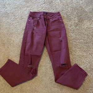 Burgundy ripped jeans